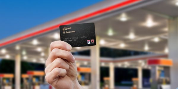 hand holding a Flyers and Quick Fuel fleet credit card